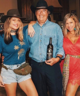 Jon Patrick Ferguson with his two daughters Fergie and Dana